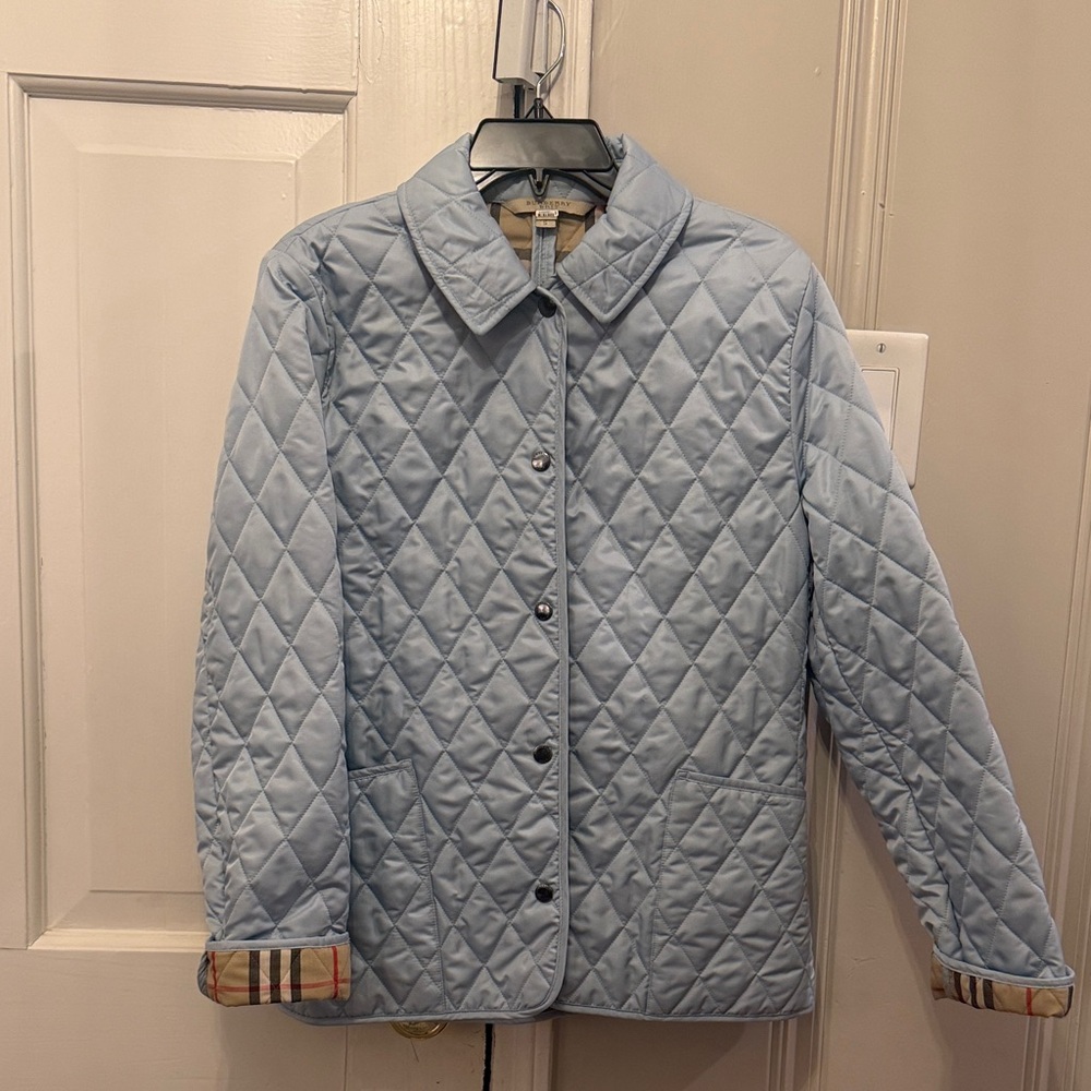 Burberry Brit light Blue Quilted Jacket with Classic Check Trim.